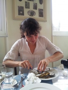 Shucking oysters in the Company Shed
