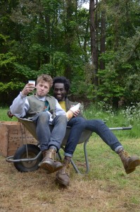 Angus and DeVonn in a wheelbarrow with some Graham's milk.