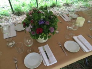 Tables decorated with local flowers.