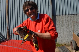 Huge lobsters are caught off East Lothian. Here is Jack Dale with a prime specimen by his car, a 1968 Triumph. 